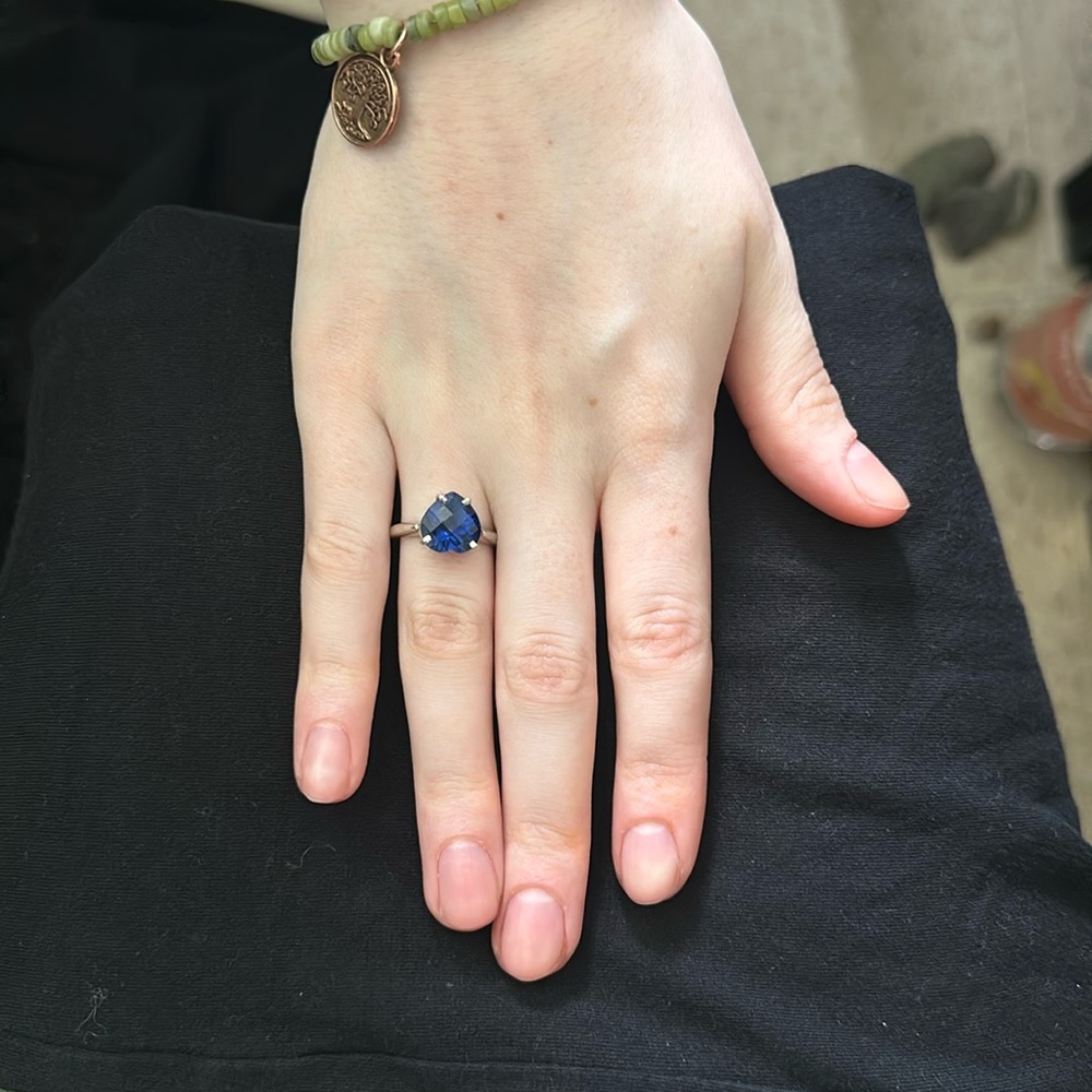 brand new silver band and freshly cleaned heart stone ring